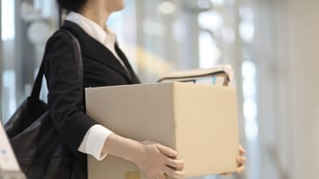 Woman Carrying Box